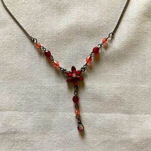 Silver colour chain necklace with red and pink beads/flower